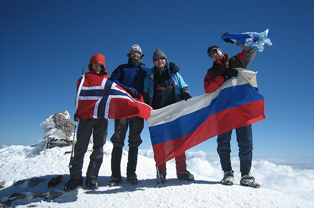 On the summit of Mount Elbrus in the international MCS AlexClimb climbing team