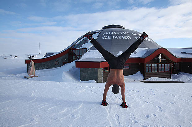 How else could I mark my crossing of the Arctic Circle in Norway if not by a handstand?!