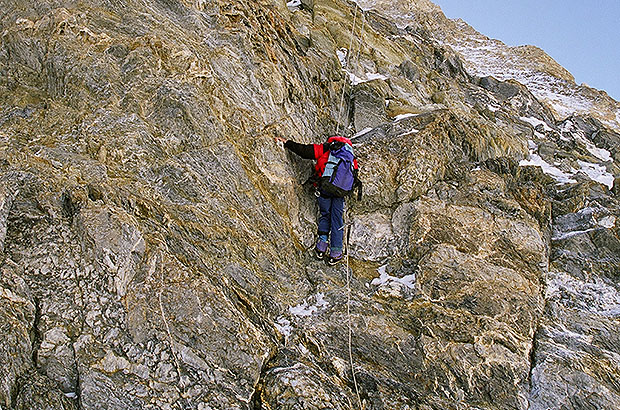Passing a steep rocky section of the Pogrebetsky ridge, climbing Khan Tengri