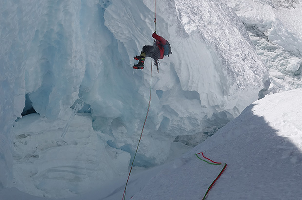 Simpson found himself hanging over the overhanging crevasse on a short rope - with no way to return to the slope