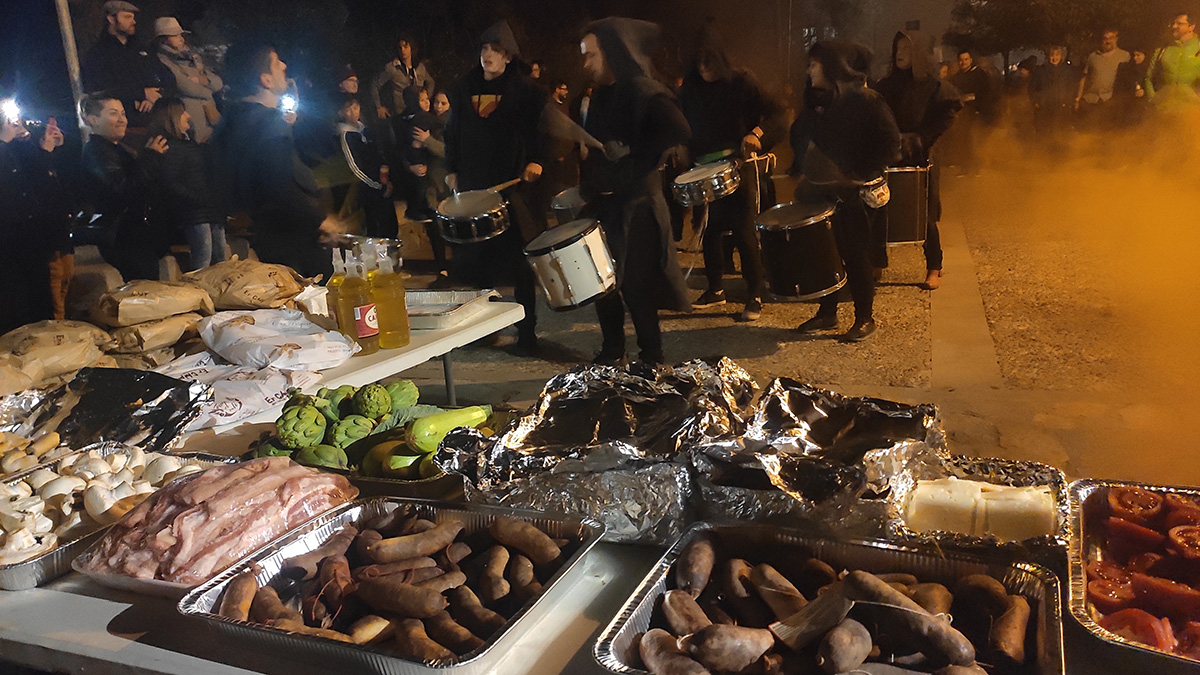 Tables with a wide variety of food appear on the streets - everything is free this night