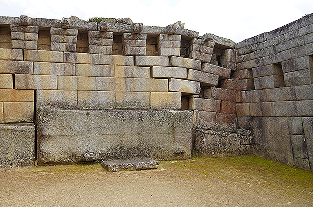 Fragment of a building damaged by an earthquake. The builders did not use any mortar for laying the stones. Exceptionally precise fit