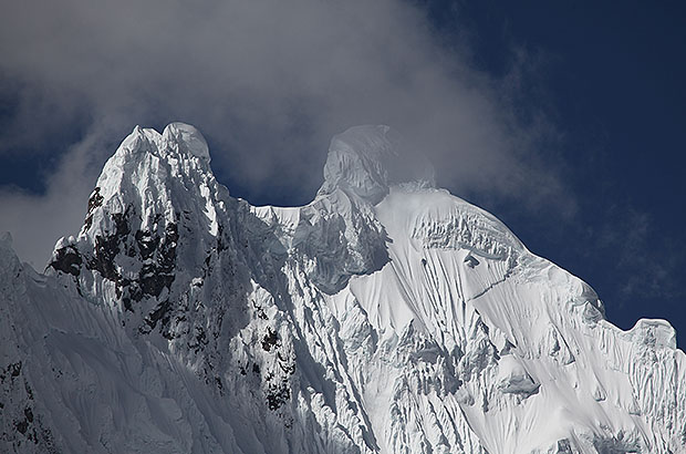 Openwork snow cornices are a specific feature of many climbing routes in the Peruvian Andes