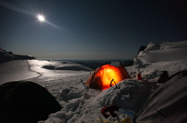 The camp on the Berel saddle wakes up and the climbers are preparing for the ascent of Mount Belukha.