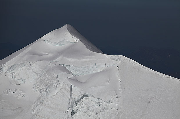 The summit dome of Mount Belukha, view from the Berel ridge.
