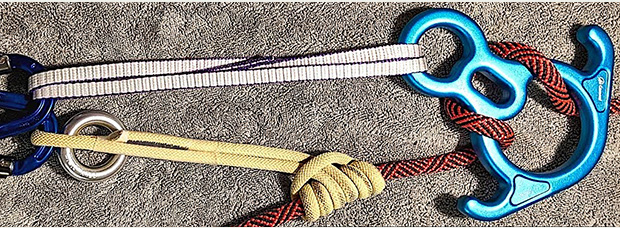 Using a Prussik knot when rappelling on a Figure Eight to belay the lower end of the rope