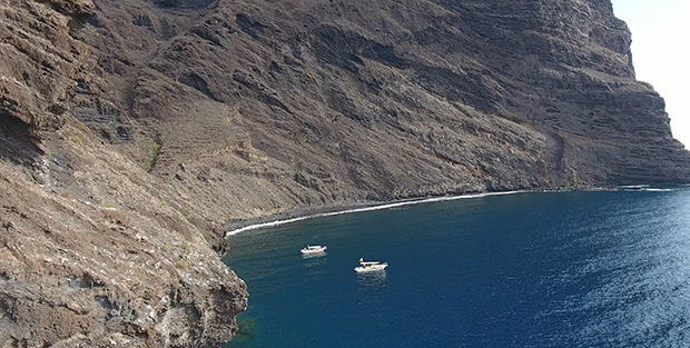 Boats await tourists at the exit of Masca Canyon