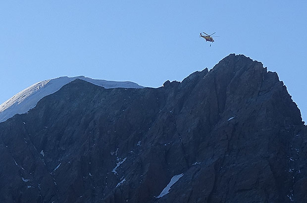 Rescue work using a helicopter in the Italian Alps, Monte Rosa massif
