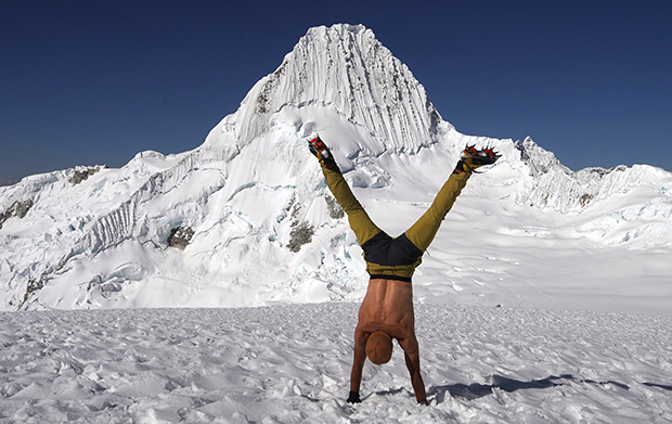 After completing the trekking route in the Cordillera Huayhuash, you can even allow yourself to stand on your hands at the foot of the most beautiful mountain in the world - Nevado Alpamayo