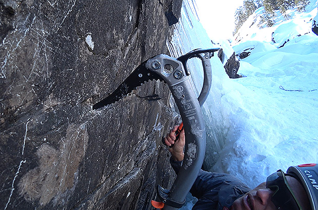 Practicing drytooling techniques in a special climbing sector in the Rjukan area, Norway