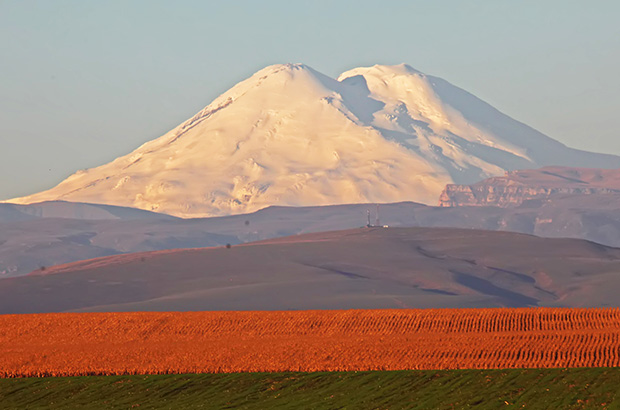 The awesome Mount Elbrus at dawn seems to soar over the steppes of Stavropol region