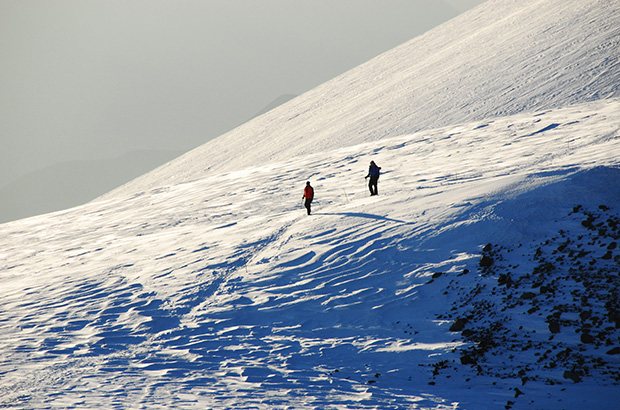 Ascent to the west Summit of Mount Elbrus from the summit Plateau