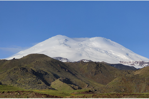 The Summit of Mount Elbrus gets a light veil of clouds - that is a clear sign of coming bad weather