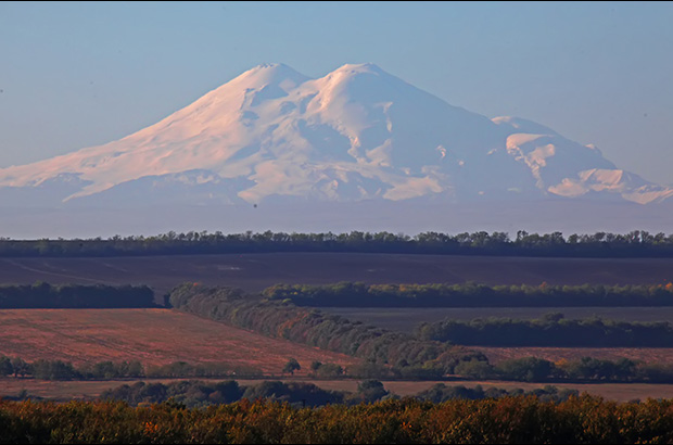 The giant two-headed Mount Elbrus, soaring over the plains of the Stavropol Krai