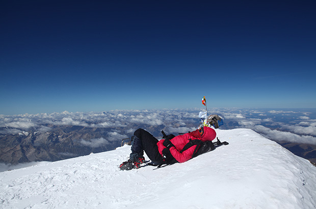 Well-deserved rest on the summit of Mount Elbrus