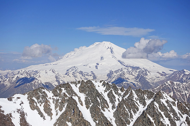 In May Mount Elbrus is still winter white, but already gets some summer impression