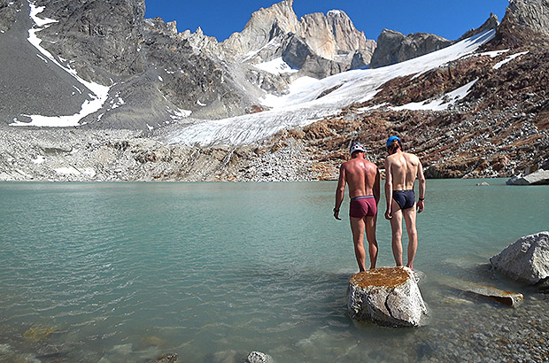 Swimming in a mountain lake at the foot of Mount Fitz Roy, Argentina, Patagonia