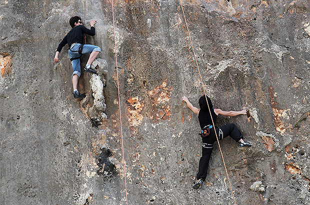 Climbing on the slab rockclimbing routes in the Creveta sector in Mallorca