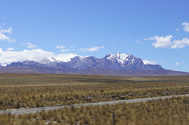 View of the Cordillera Huayhuash mountain system from the bus window on the way to Huaraz from Lima