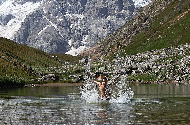 Swimming in a mountain lake after climbing Mount Gestola