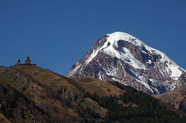 Mount Kazbek in Georgia and Gergeti Monastery
