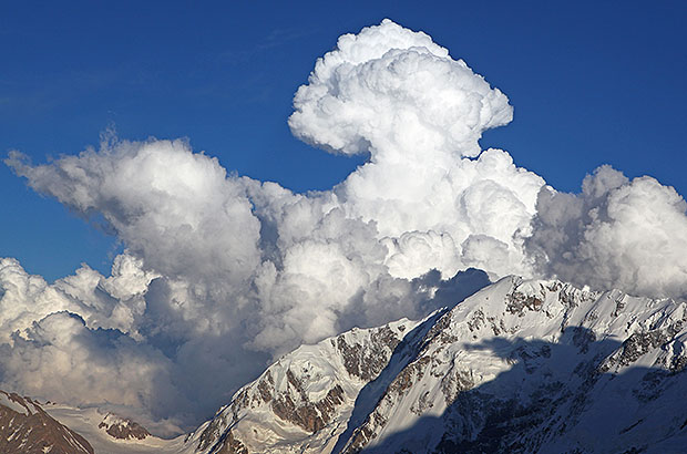 Altocumulus - a cloud of characteristic shape, a harbinger of a thunderstorm