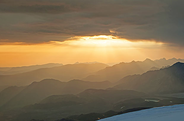 Cloudy sunset in the Caucasus mountains