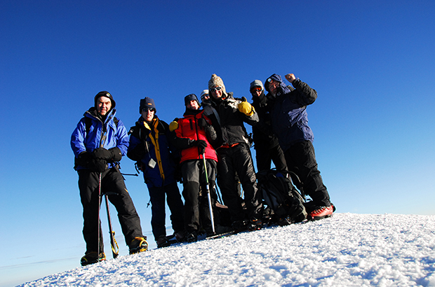 At the summit of Mount Elbrus after climbing along the route from the South