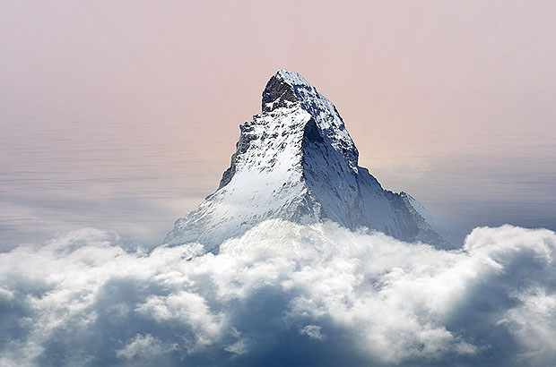 The top of the Matterhorn soars above the clouds