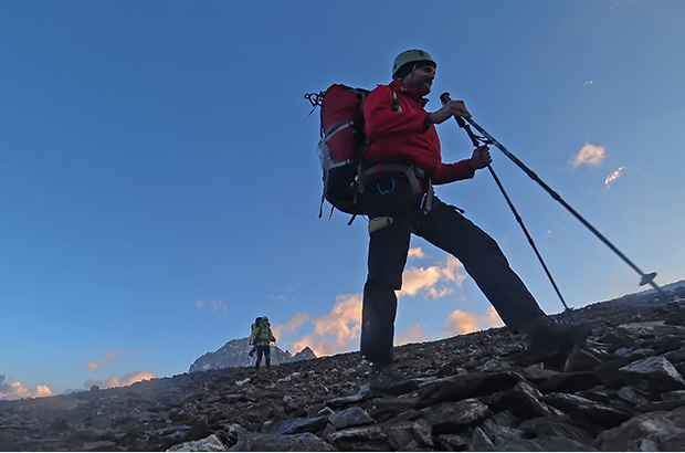 Using trekking poles when walking on a glacier