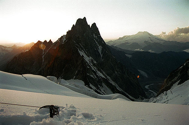 Sunset on the Ushba plateau, view of Mount Shkhelda and Mount Elbrus