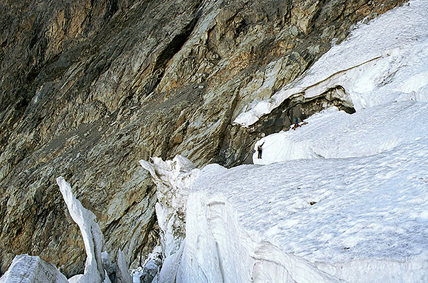Passing the upper (highly crevassed) part of the Ushba icefall. Clinging to the rocks of Shchurovsky Peak
