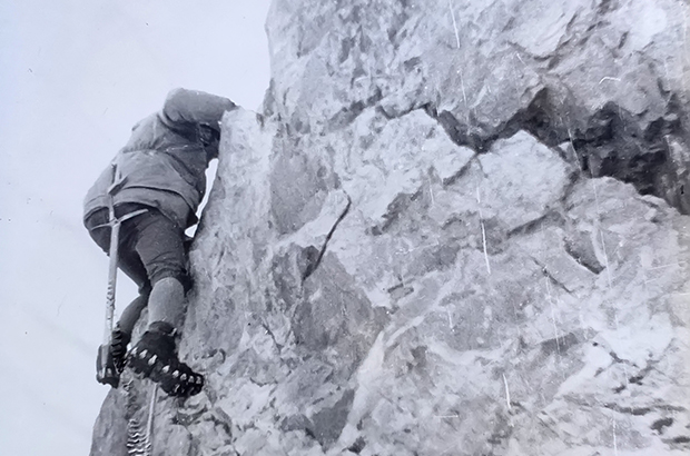 Climbing a rocky section during the ascent of Mount Ushba